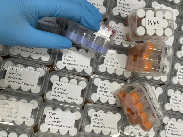 GLOW 70mg blend vials in 99Purity-Peptide warehouse, ready for skin-rejuvenation research shipping.