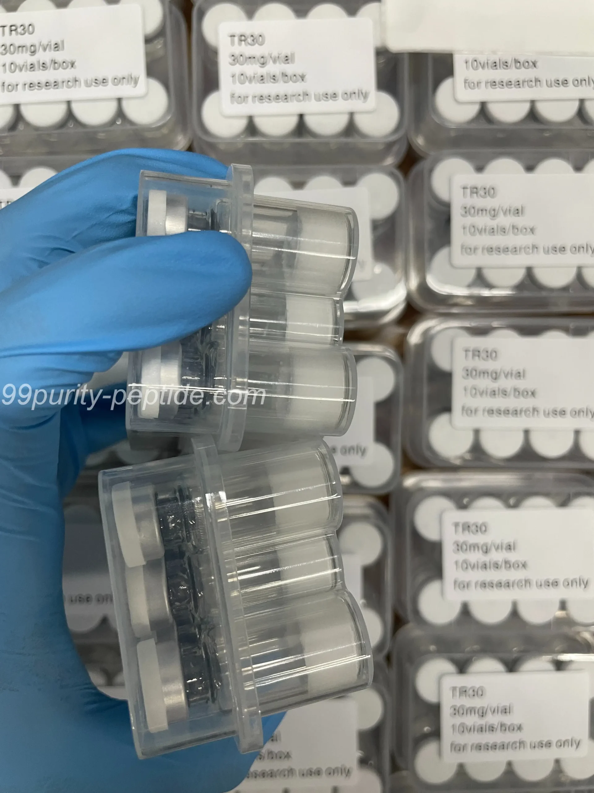 Stock photo of Ipamorelin 10mg vials in our sterile warehouse for muscle research supply.